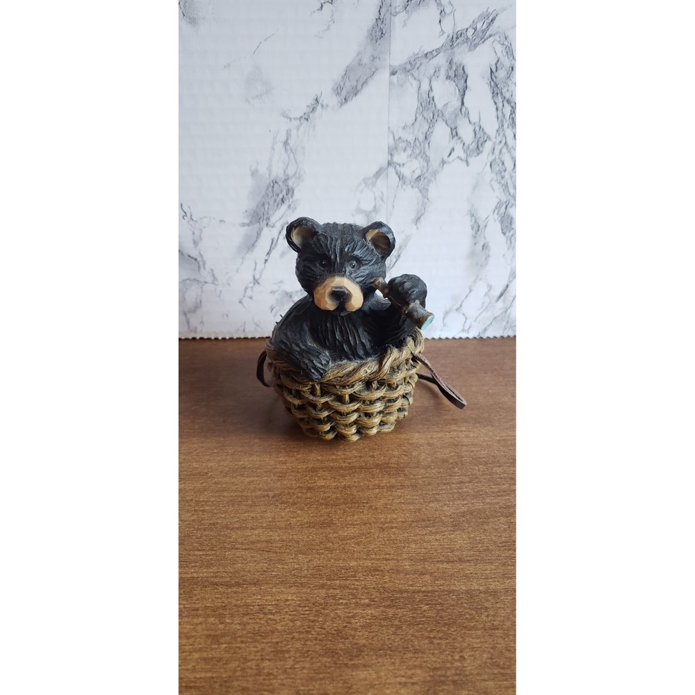 Youngs Inc. Nothwood Black Bear In Wicker Basket. Resin Figurine